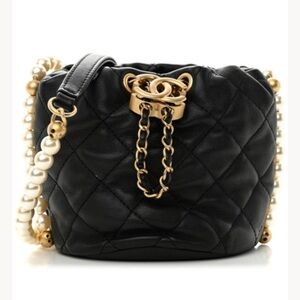 CHANEL Black Quilted Shoulder Bag with Gold and Pearl Accents
